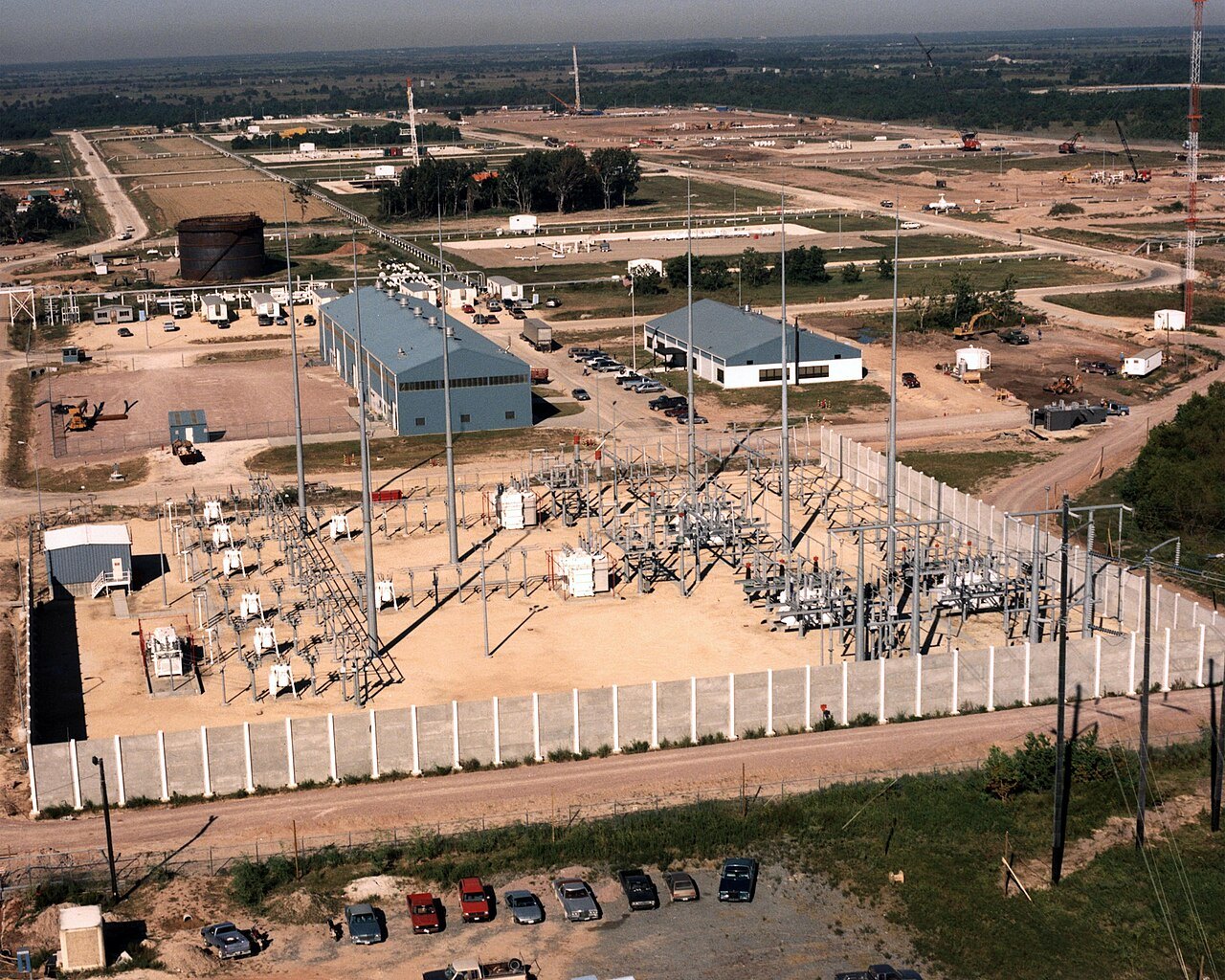 Archival aerial of a Strategic Petroleum Reserve site: substation, tank, well pads